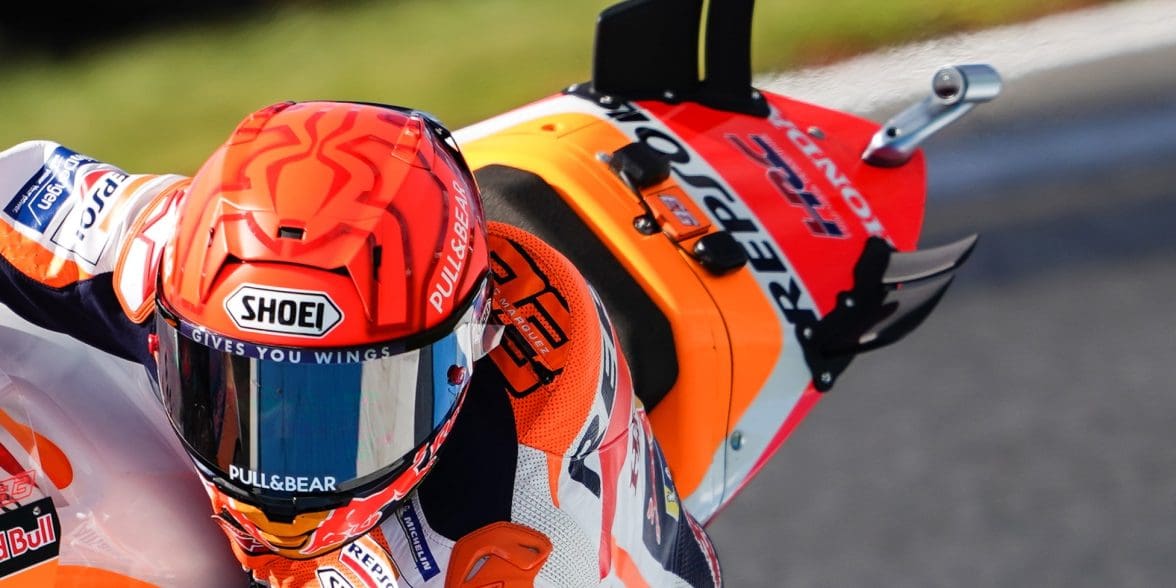 A view of racers on the MotoGP grid, doing what they do best. Media sourced from The-Race.