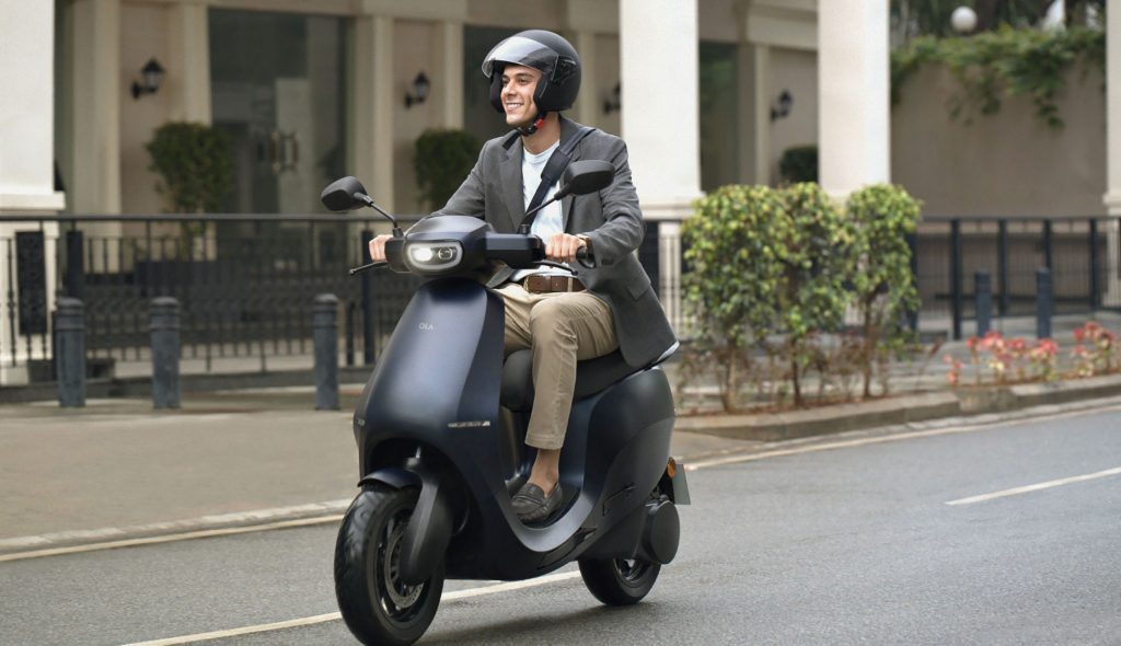 A side view of a rider enjoying the Ola Electric S1 Scooter