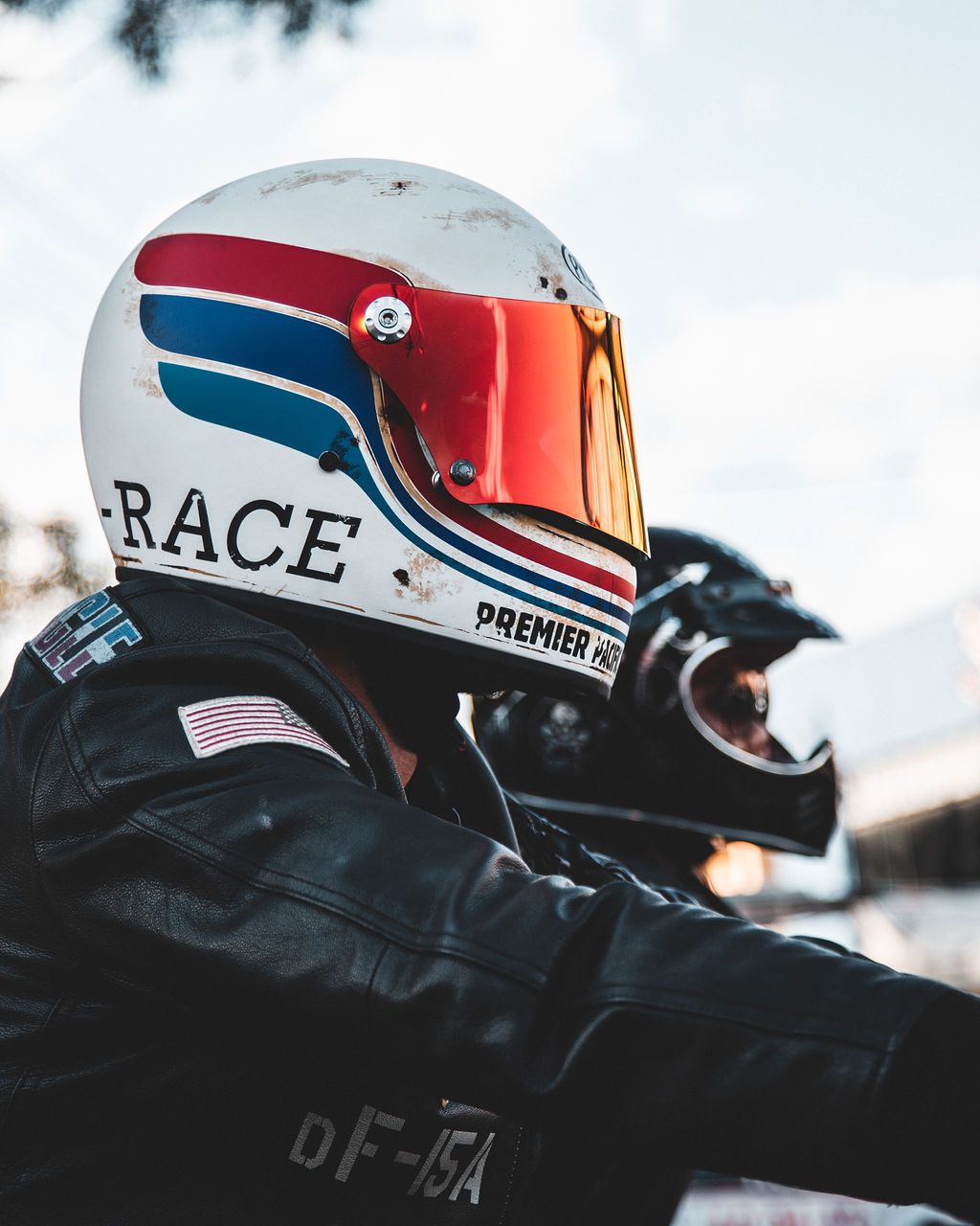 Motorcyclist with a Retro helmet at dusk