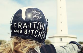 traitors and bitches helmet worn by female rider