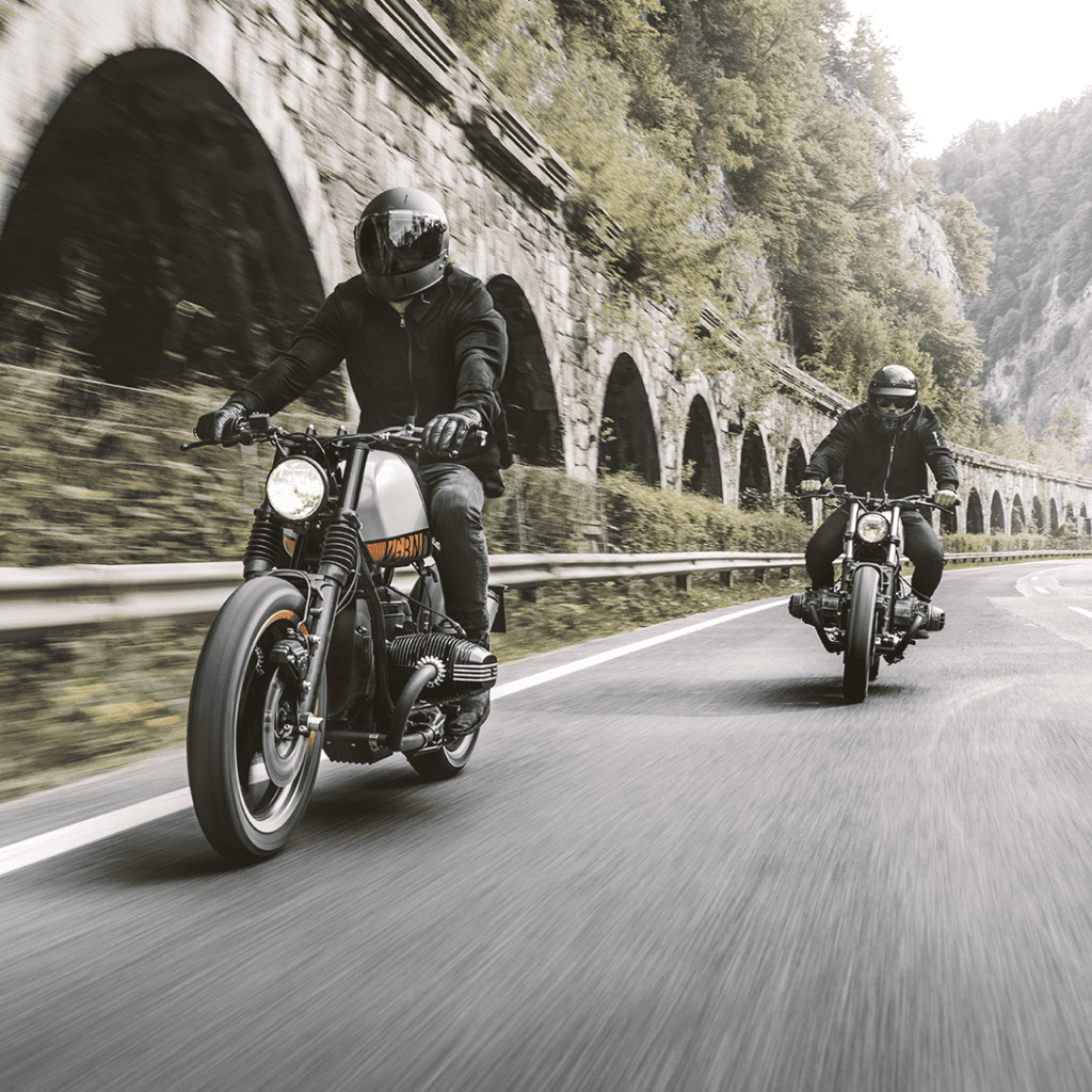 a front view of two riders trying out the VELDT helmet