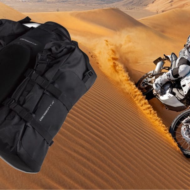 Ducati's DesertX next to a pair of soft side bags. Media sourced from Ducati and Ducati's gear page.