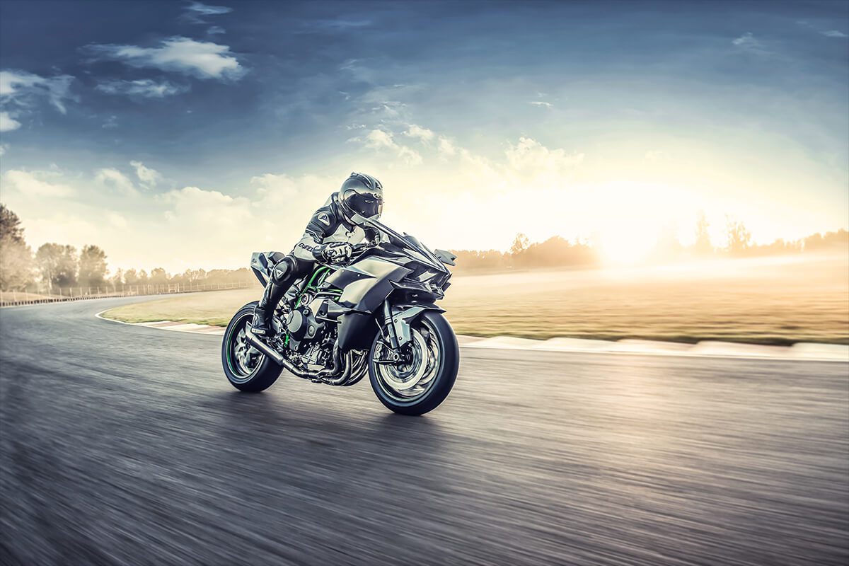 2021 Kawasaki Ninja H2R at speed with sunset background