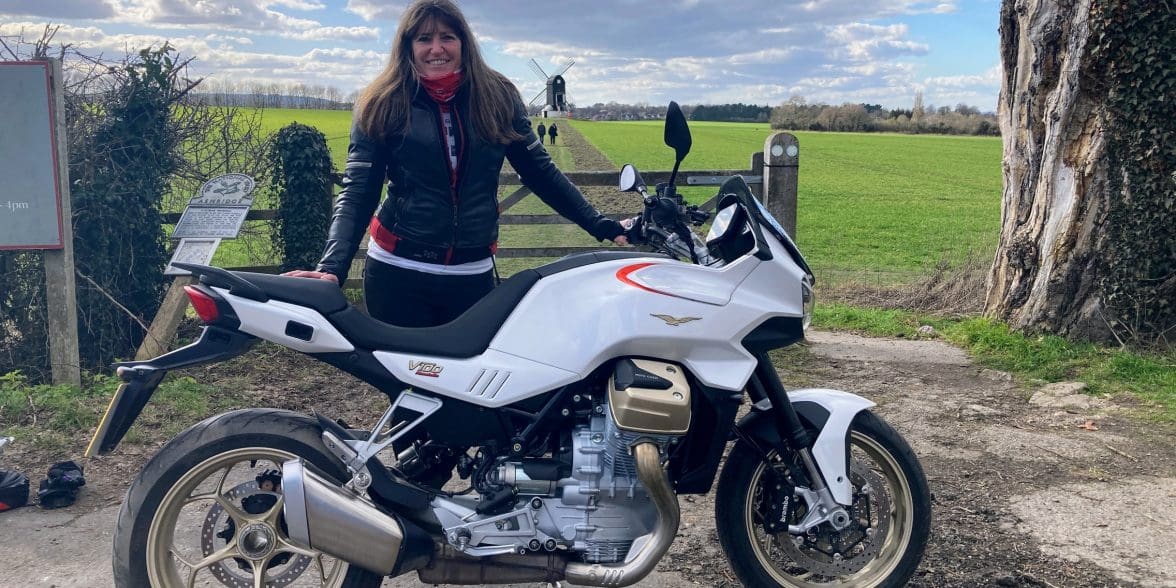 BikerKaz standing next to the 2022 Moto Guzzi V100 Mandello