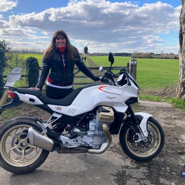 BikerKaz standing next to the 2022 Moto Guzzi V100 Mandello