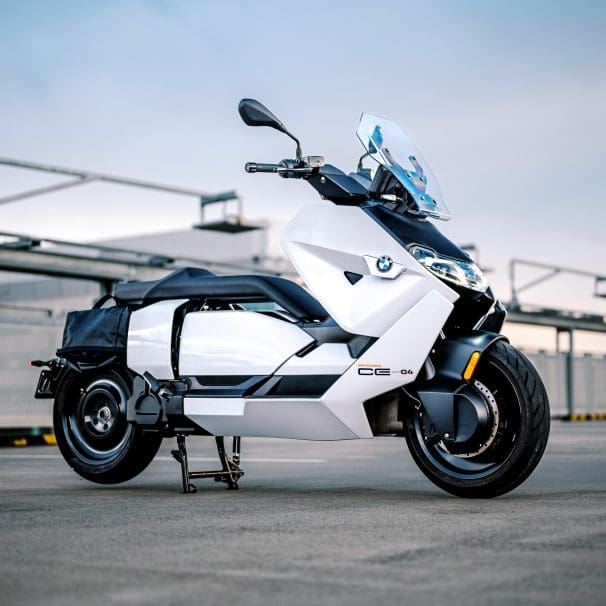 BMW's CE-04 electric scooter on a carpark rooftop at sunset