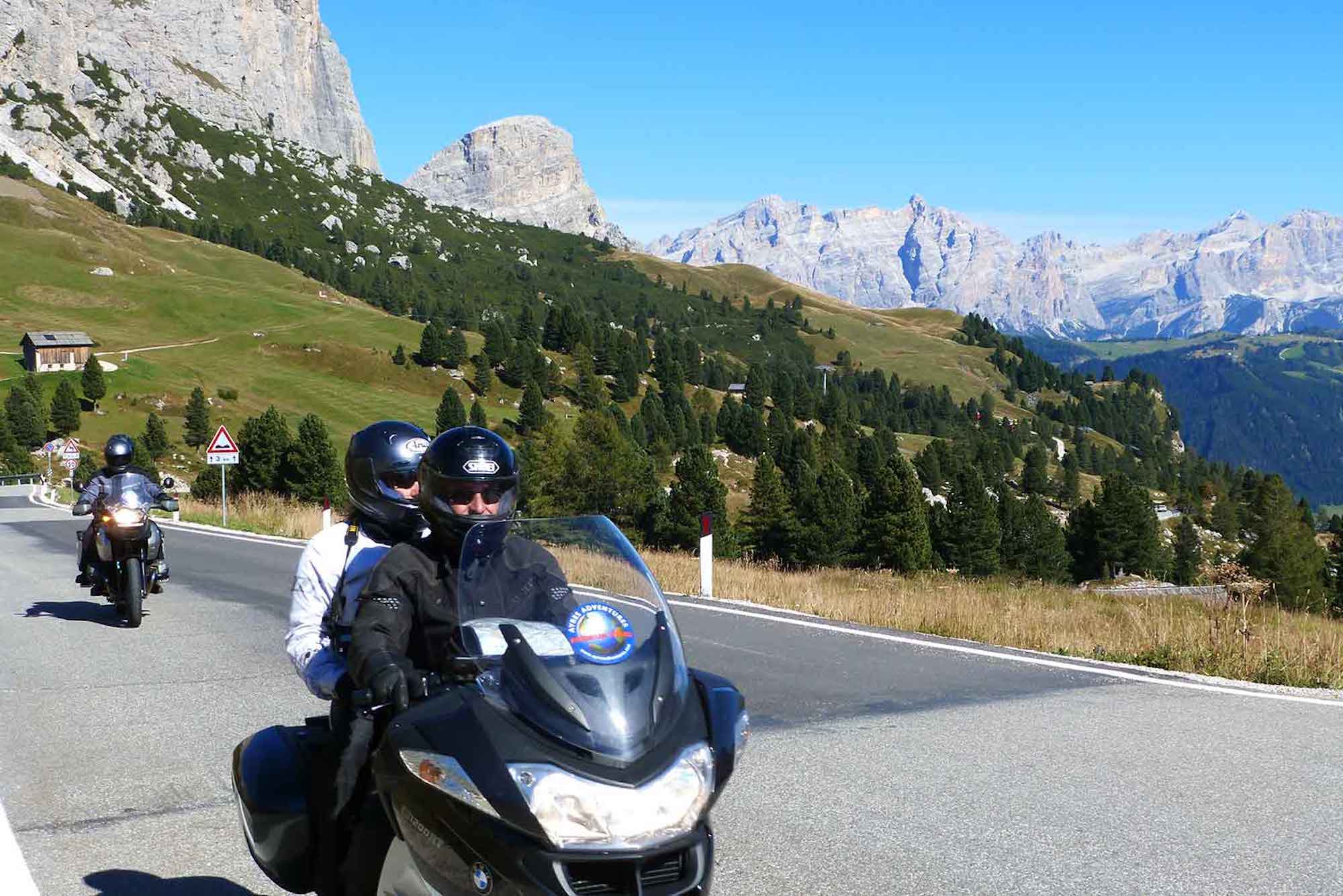A motorcyclist enjoying the view of the Italian Dolomites. Media sourced from Ayres Adventures.