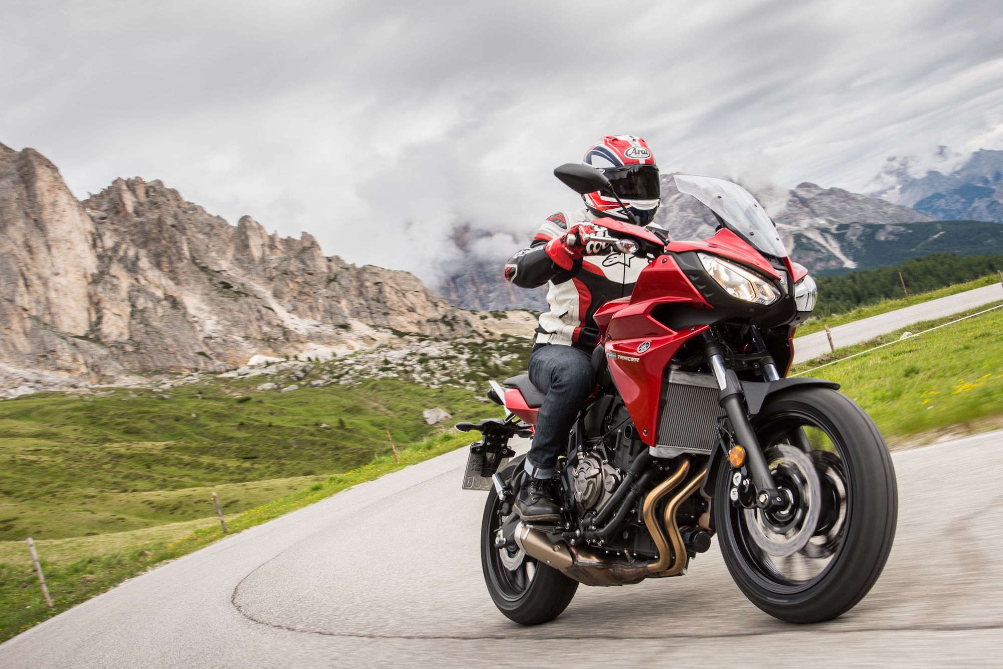 A motorcyclist enjoying the view of the Italian Dolomites. Media sourced from Visordown.