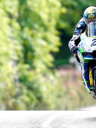 A racer in the Isle of Man TT. Media sourced from the Isle of Man TT.