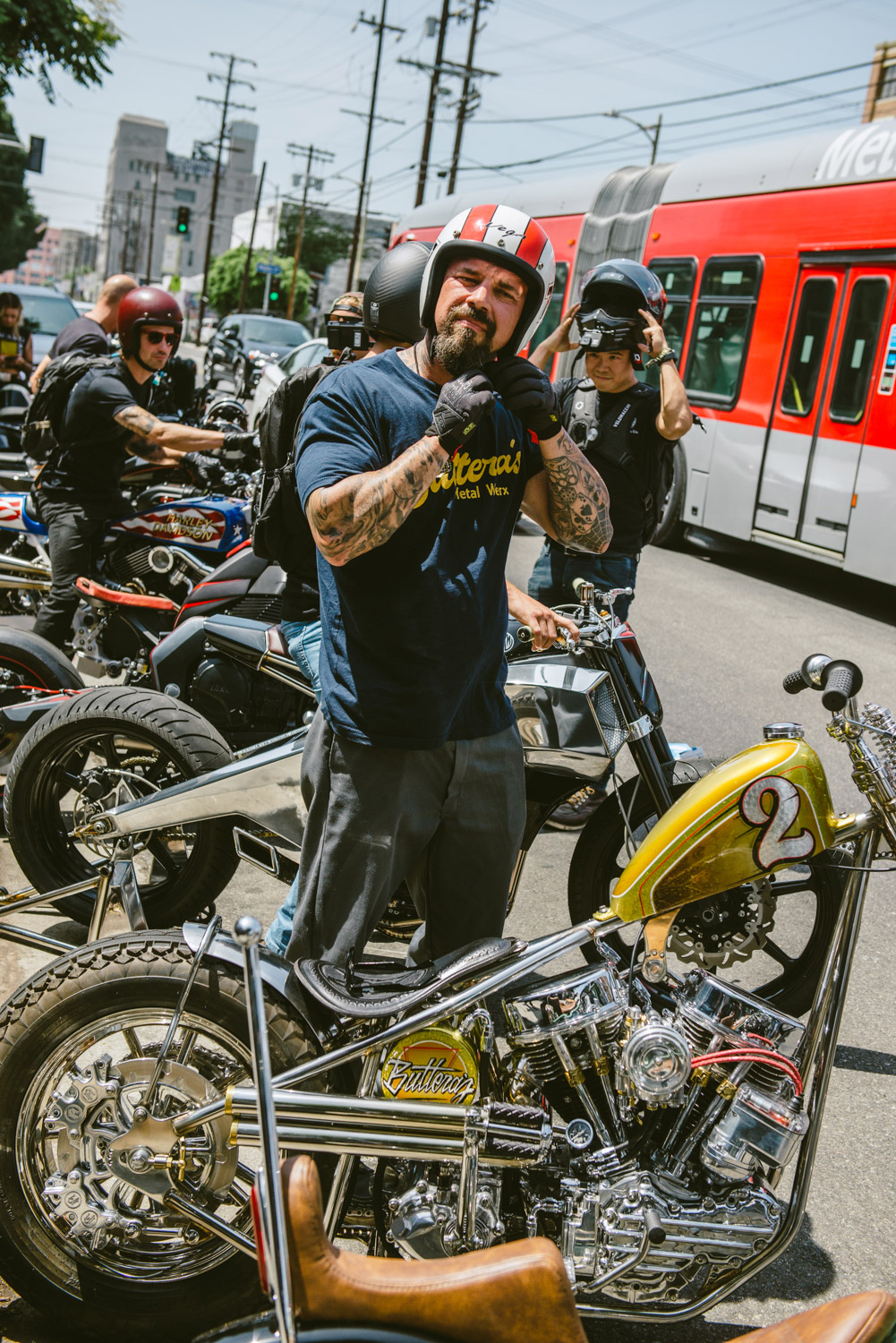 A slew of bikers with pretty bikes. I'm drooling over the one second from the front, personally...Media sourced from The Lightning Bolt's website.