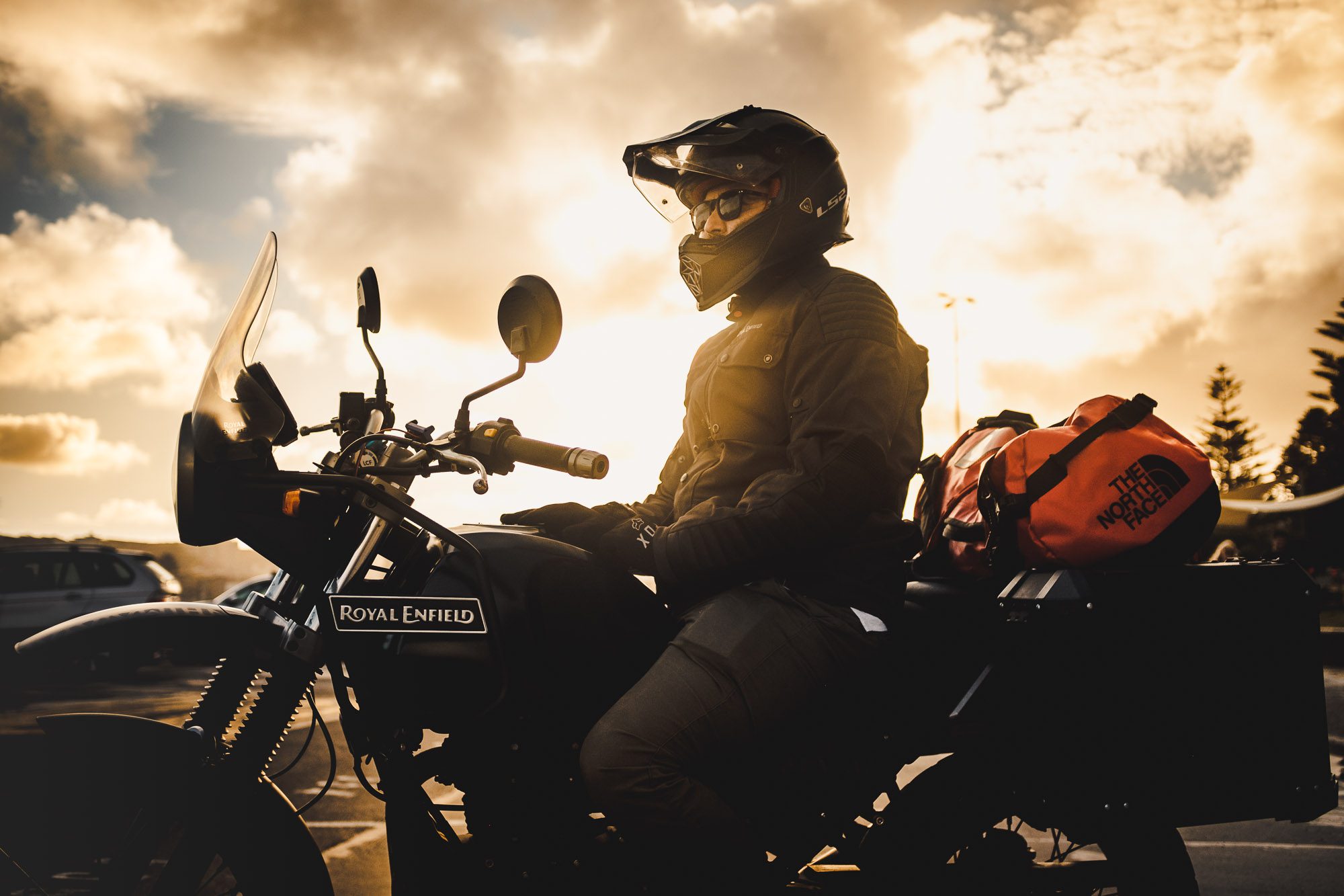 Daniel 'Beardy' McLaughlin on a Royal Enfield Himalayan at Bondi Beach