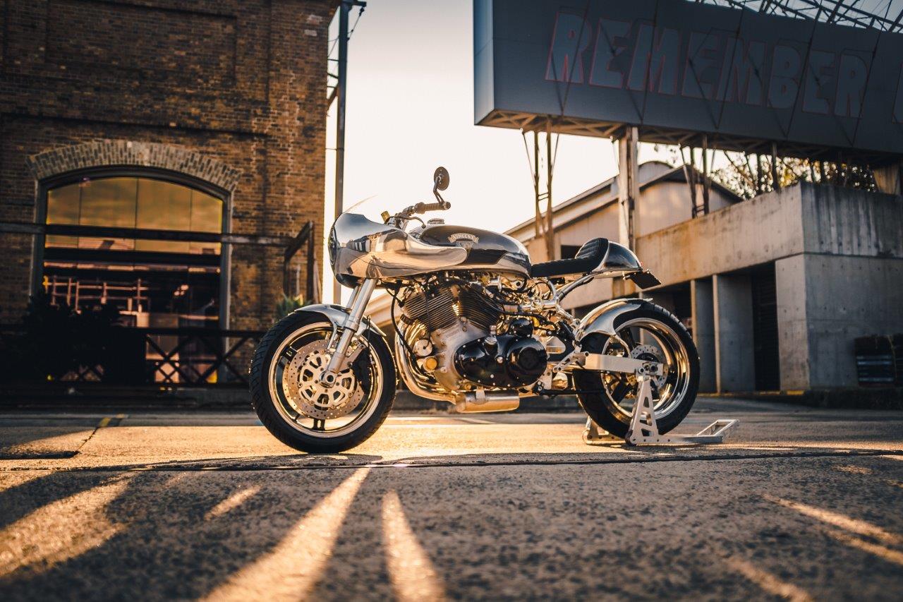 A custom Vincent Black Shadow motorcycle at dusk by MotorRetro Sydney