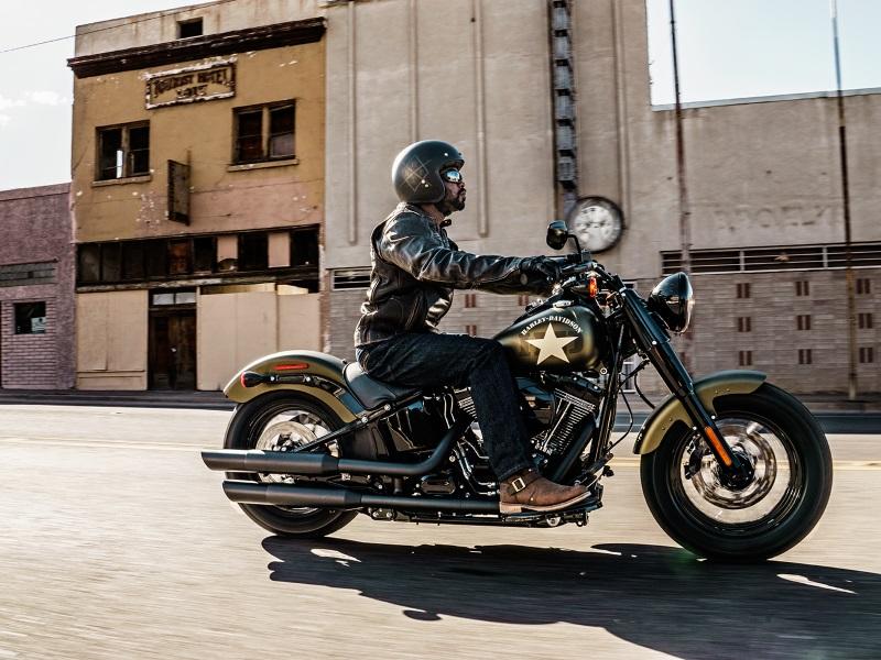 Harley rider wearing a three quarters helmet