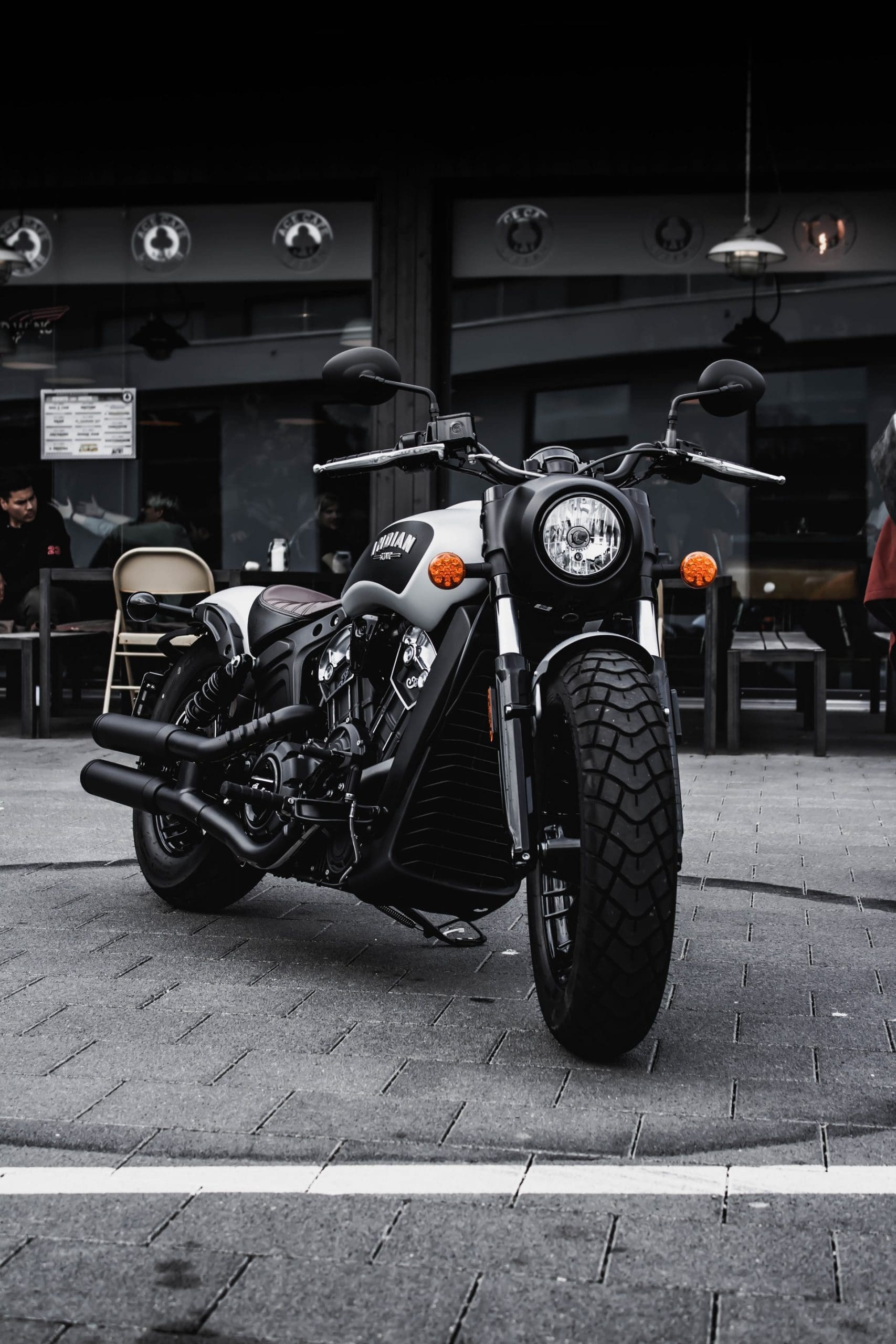 Wallpaper Black and White Sports Bike Parked on Gray Concrete Floor  Background  Download Free Image