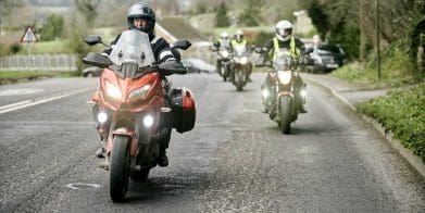Motorcyclists revving through a highway tour. Media sourced from NMC.