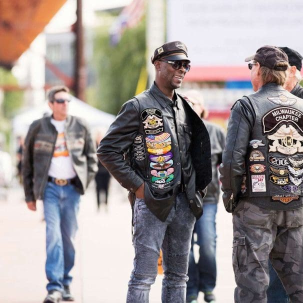 A crew of HOGs shooting the breeze. Media sourced from CycleWorld.