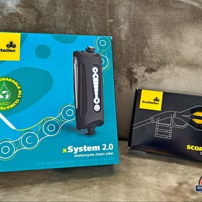 The Scottoiler xSystem 2.0 and Scorpion Dual Injector in their respective boxes.