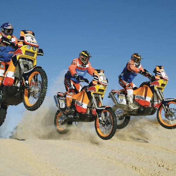 2004's Team Repsol (Honda), revving through the Dakar Rally. Media sourced from KTM.