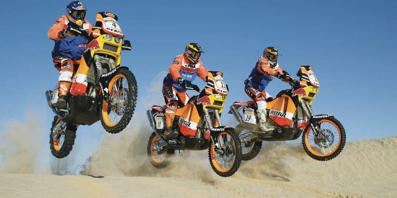 2004's Team Repsol (Honda), revving through the Dakar Rally. Media sourced from KTM.