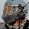 A view of a motorcycle rider using a Cardo System comm device. Media sourced from Cardo Systems.