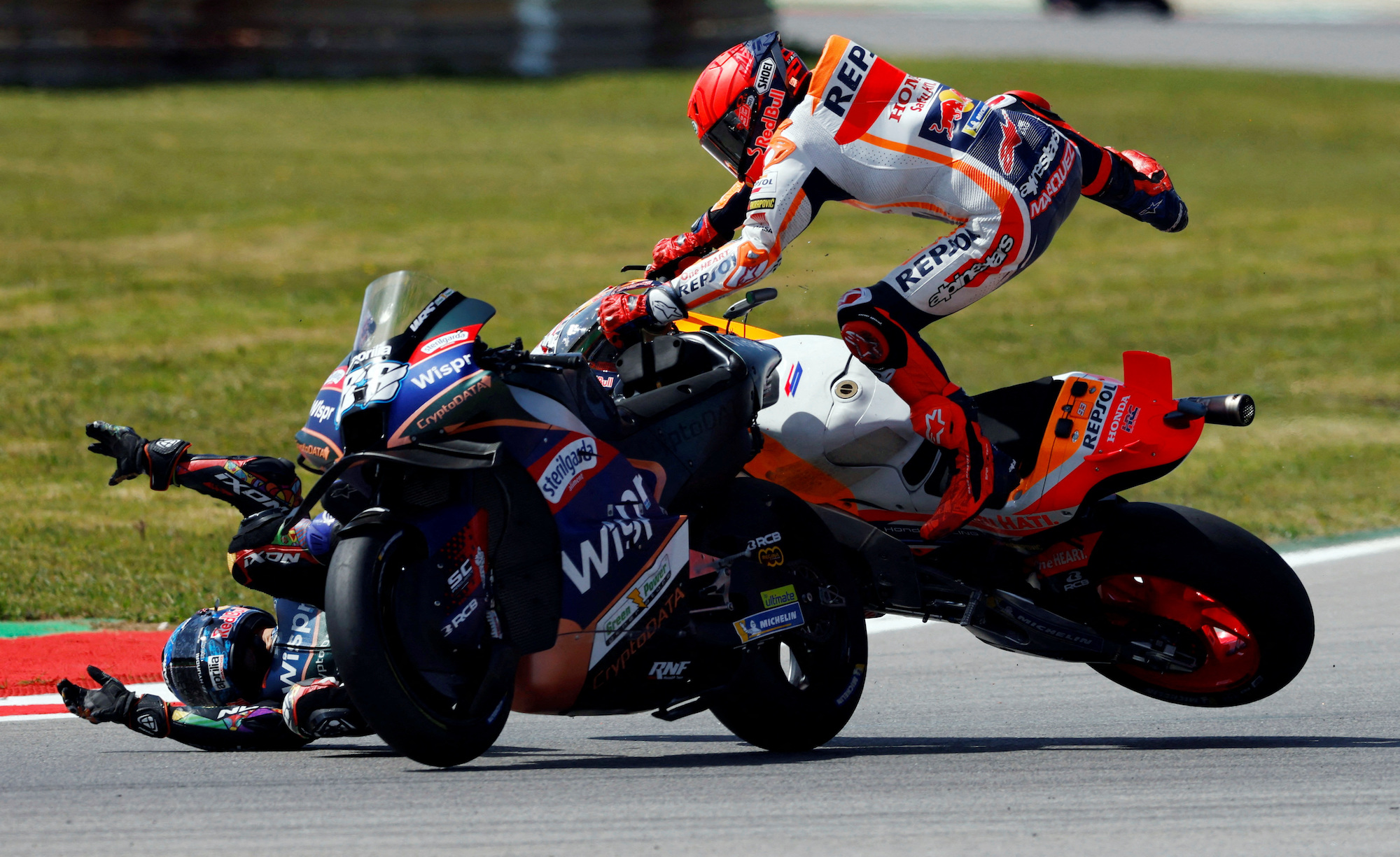 Marc Marquez, in his continued fight around the circuit, when he clipped Jorge Martin and sent him spinning. Media sourced from Reuters.