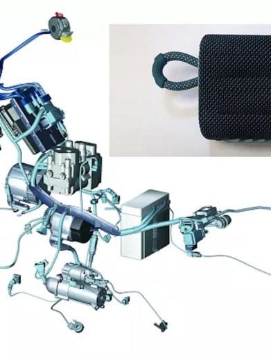 A view of a motorcycle's CAN system, with a CAN bus injector masquerading as a Bluetooth speaker above it. Media sourced from Motorcycle.com and MCN.