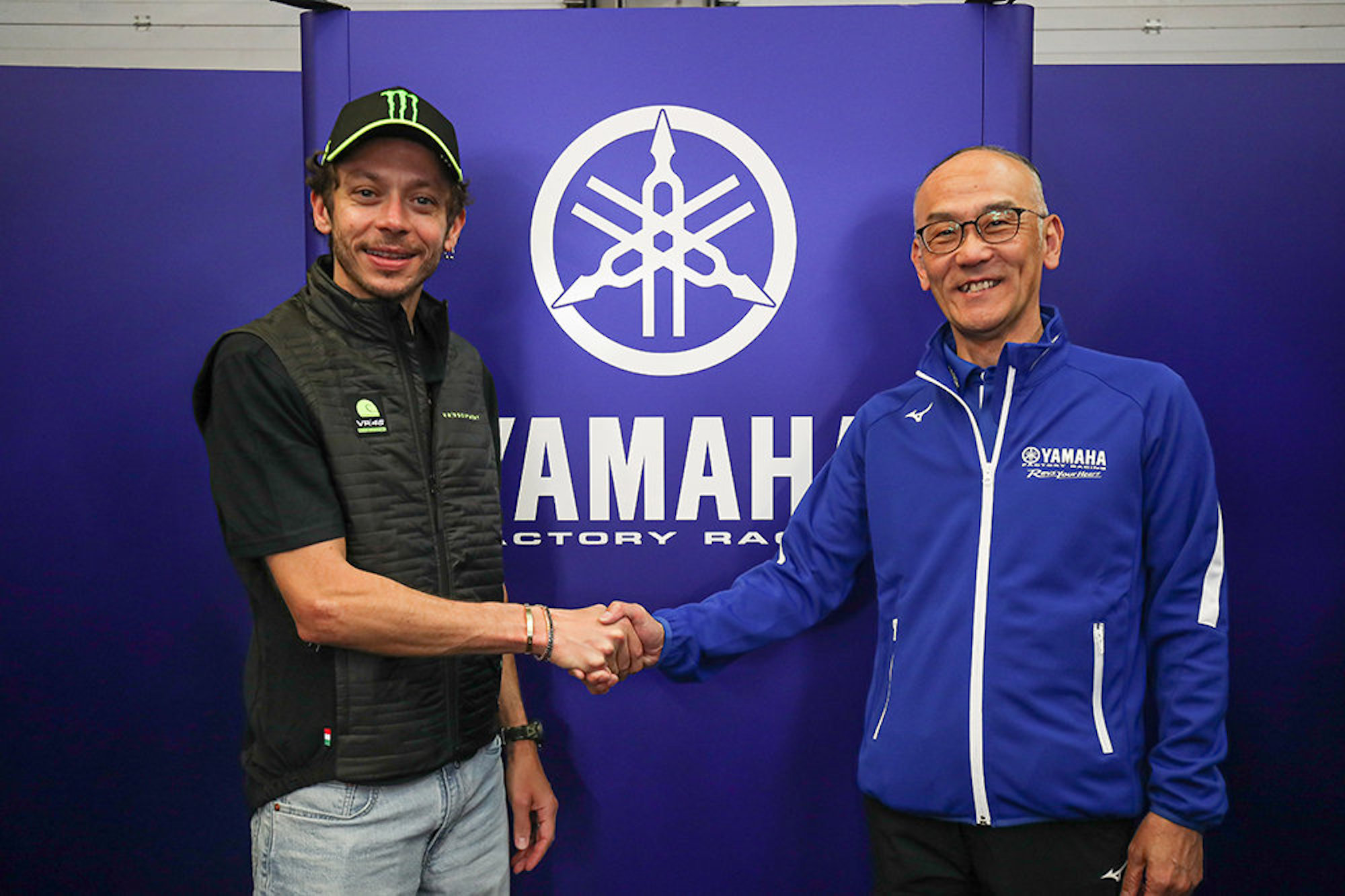 Valentino Rossi shaking hands with Tetsu Ono, General Manager Motorsport Strategy Division, Yamaha Motor Co. Media sourced from Yamaha's recent press release.