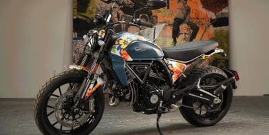 A view of Ducati's next-gen Scrambler Icon - a bike that's recently had a new livery scheme from RXART artist Mickalene Thomas, in support of art in children's hospitals. Media sourced from Ducati.