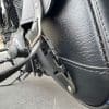 Closeup of the buckle on the swingarm bag