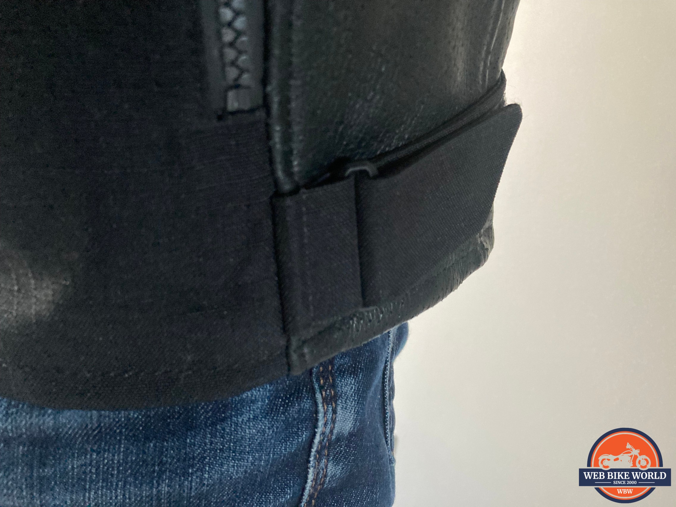 Velcro waist adjusters on the jacket