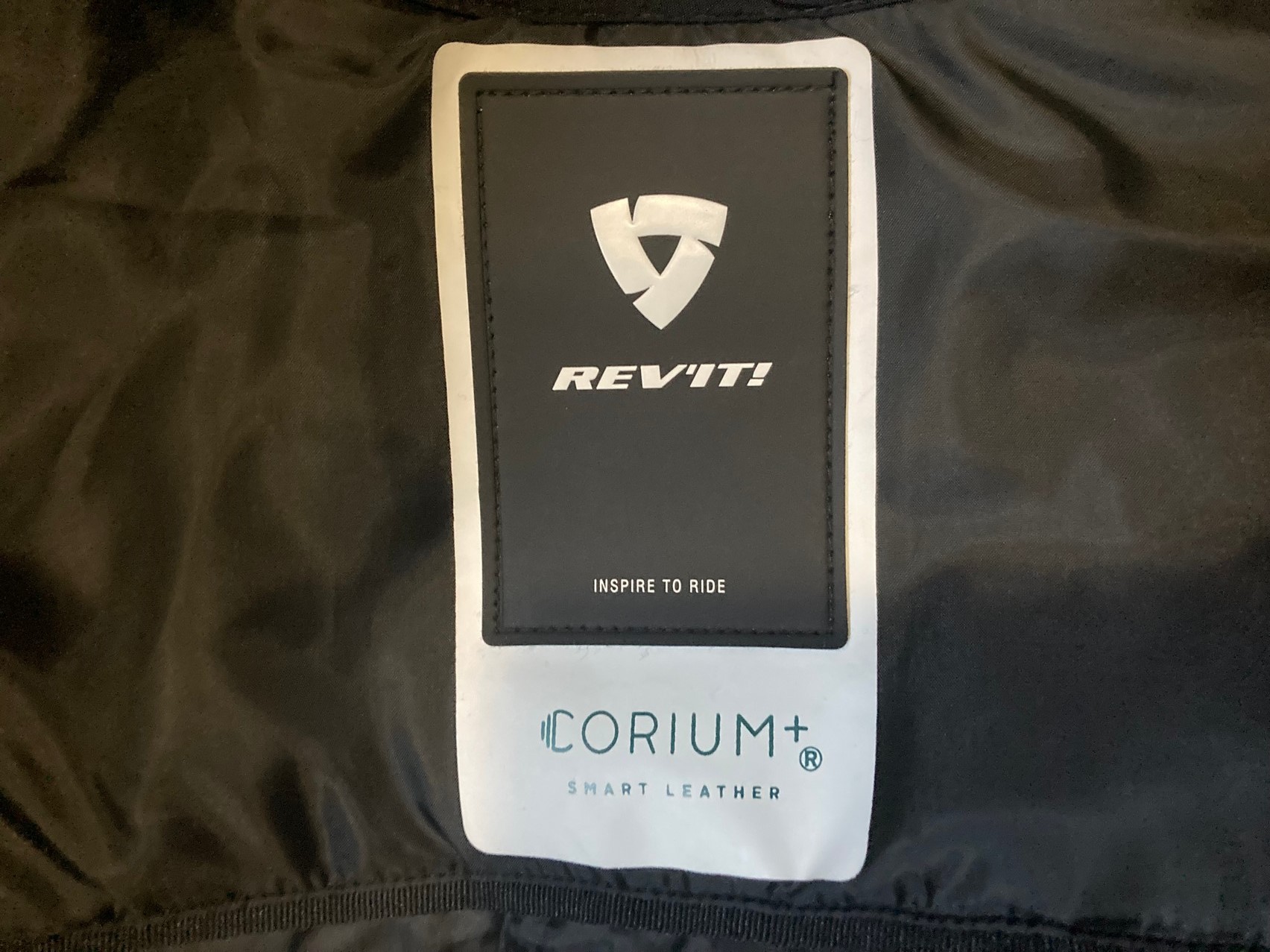 CORIUM+ interior tag on REV'IT! jacket