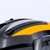 Closeup of the visor adjuster on the top of the helmet