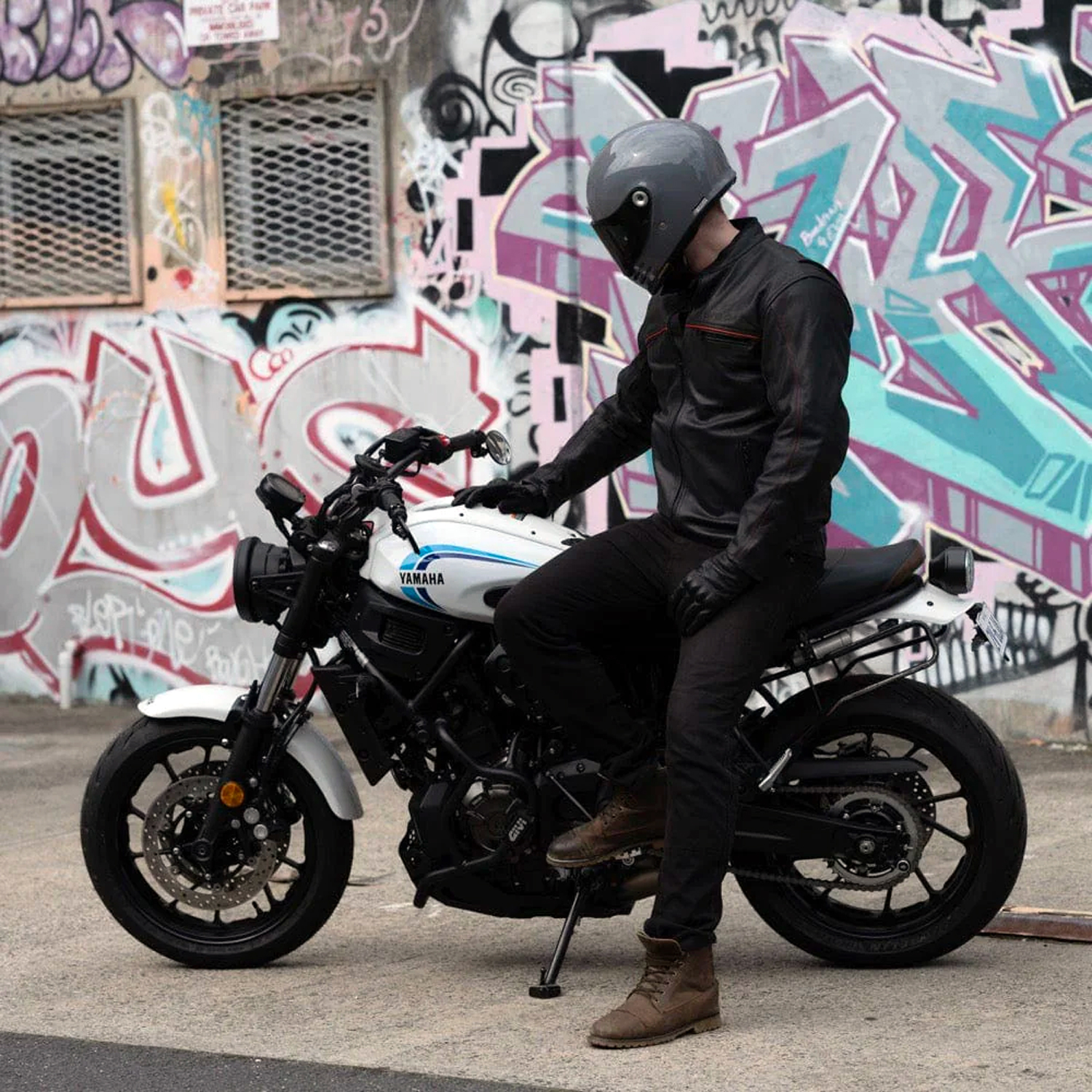 Black Pup Moto's new Rumbler Jacket on a rider with motorcycle Black Pup Moto's new Rumbler Jacket on a rider with motorcycle