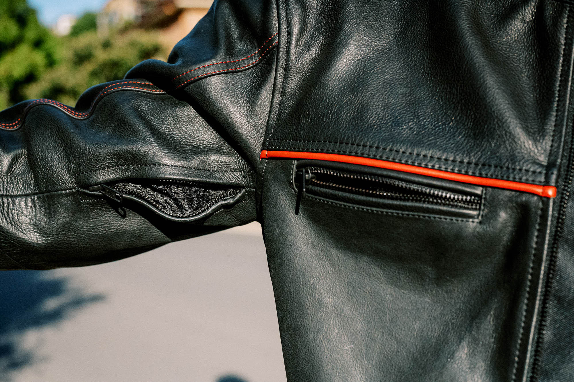 Black Pup Moto's new Rumbler Jacket on a rider - detail shot Black Pup Moto's new Rumbler Jacket on a rider - detail shot