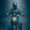 Rider sits on a Triumph Scrambler motorcycle while wearing a Black Pup Moto Rumbler leather jacket Rider sits on a Triumph Scrambler motorcycle while wearing a Black Pup Moto Rumbler leather jacket