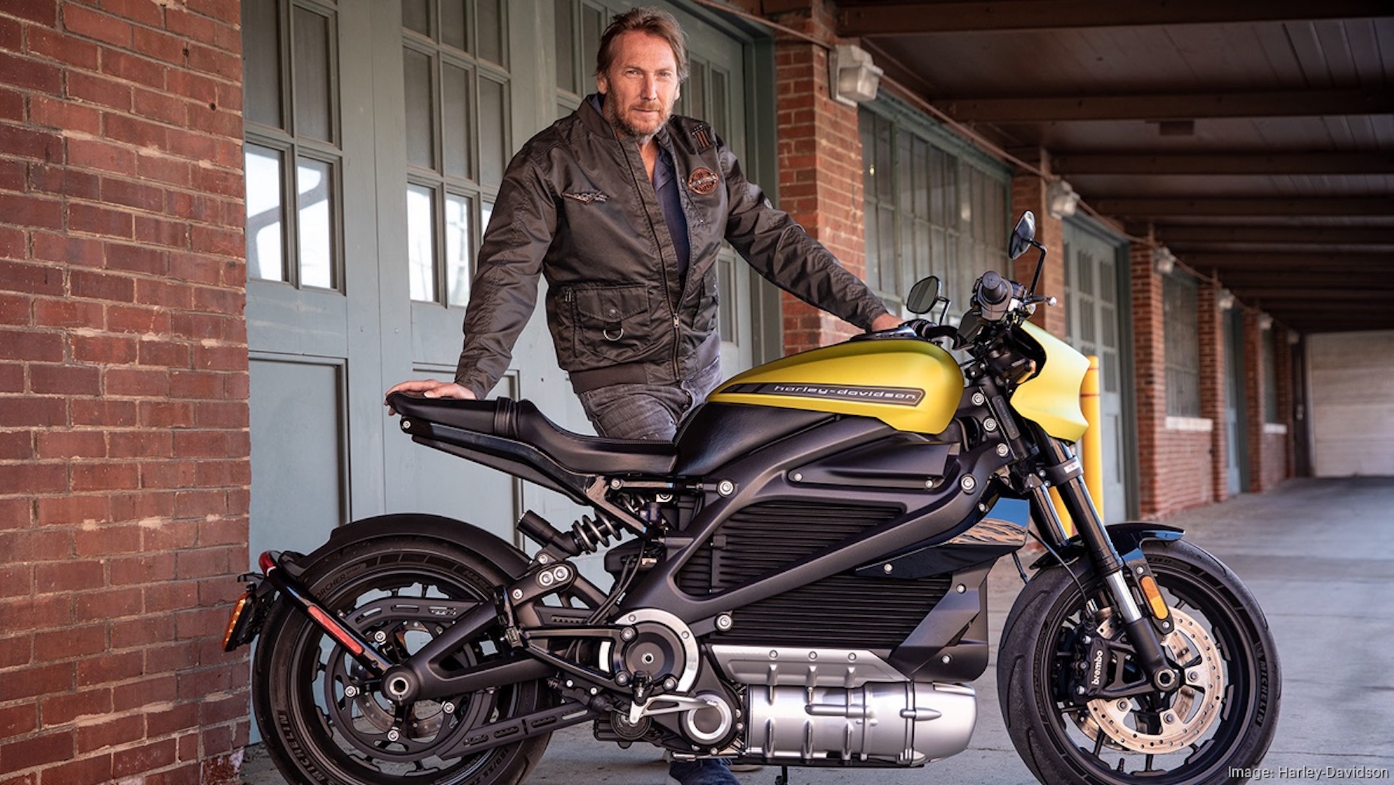 Harley CEO Jochen Zeitz with a LiveWire One. Media sourced from BizJournal.