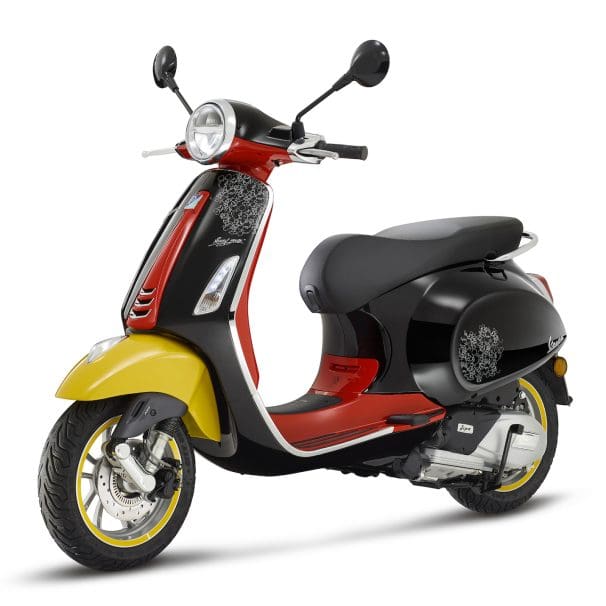 Vespa's 2023 Disney Mickey Mouse Edition scooter, built upon the brand's Primavera model. Media sourced from Piaggio's recent press release.