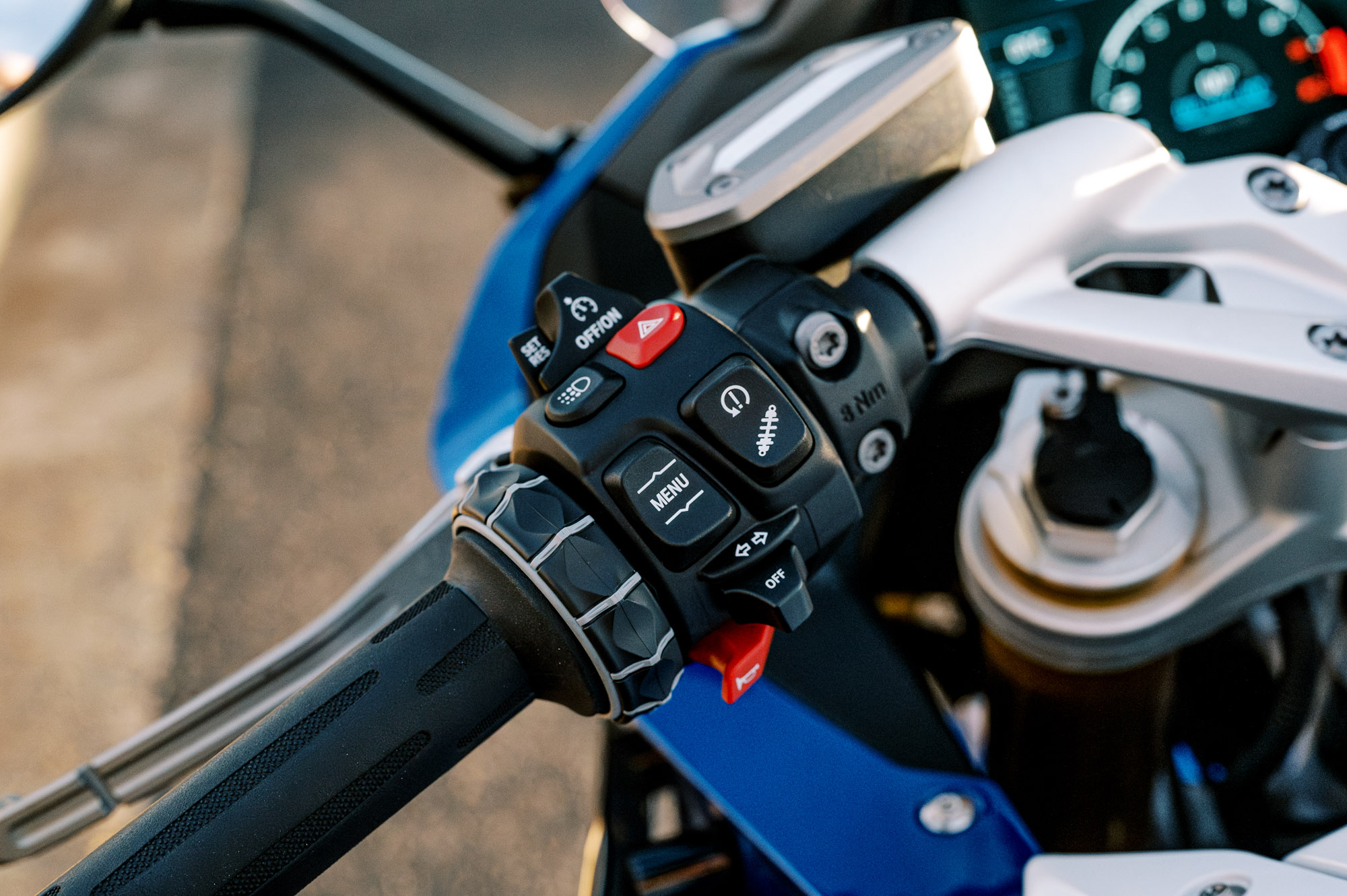 a detail of BMW's 2023 R 1250 RS motorcycle parked at sunset in Sydney