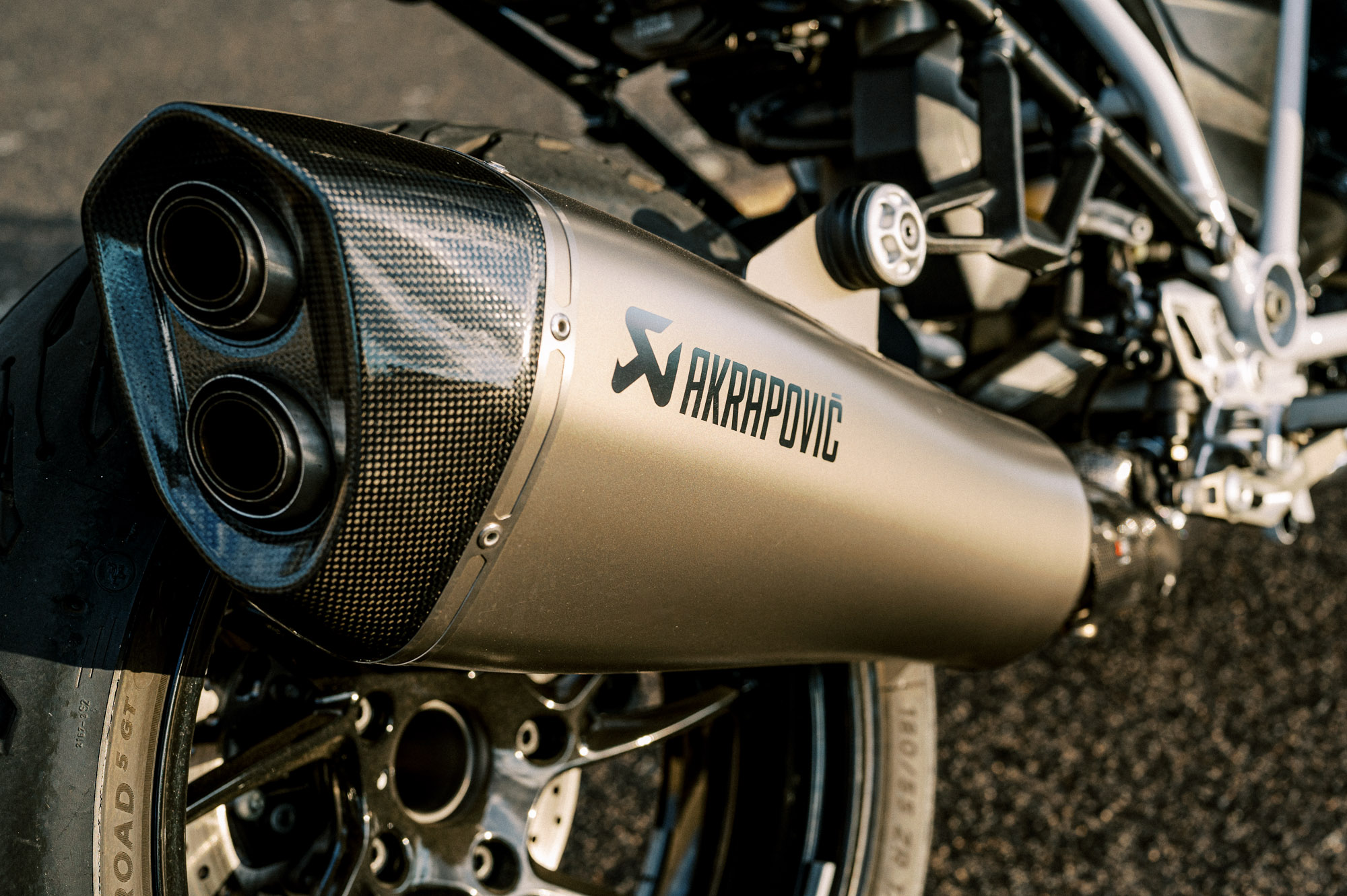 a detail of BMW's 2023 R 1250 RS motorcycle parked at sunset in Sydney
