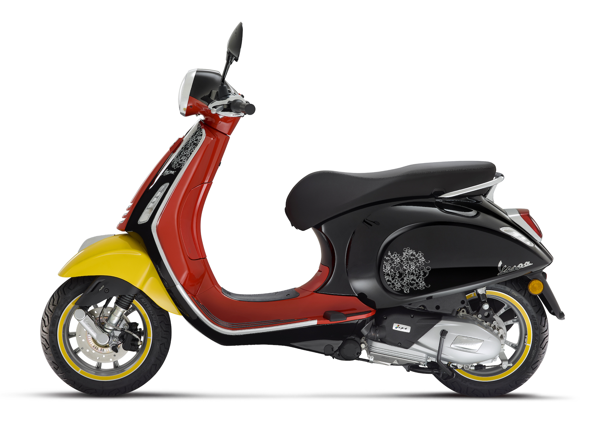 Vespa's 2023 Disney Mickey Mouse Edition scooter, built upon the brand's Primavera model. Media sourced from Piaggio's recent press release.