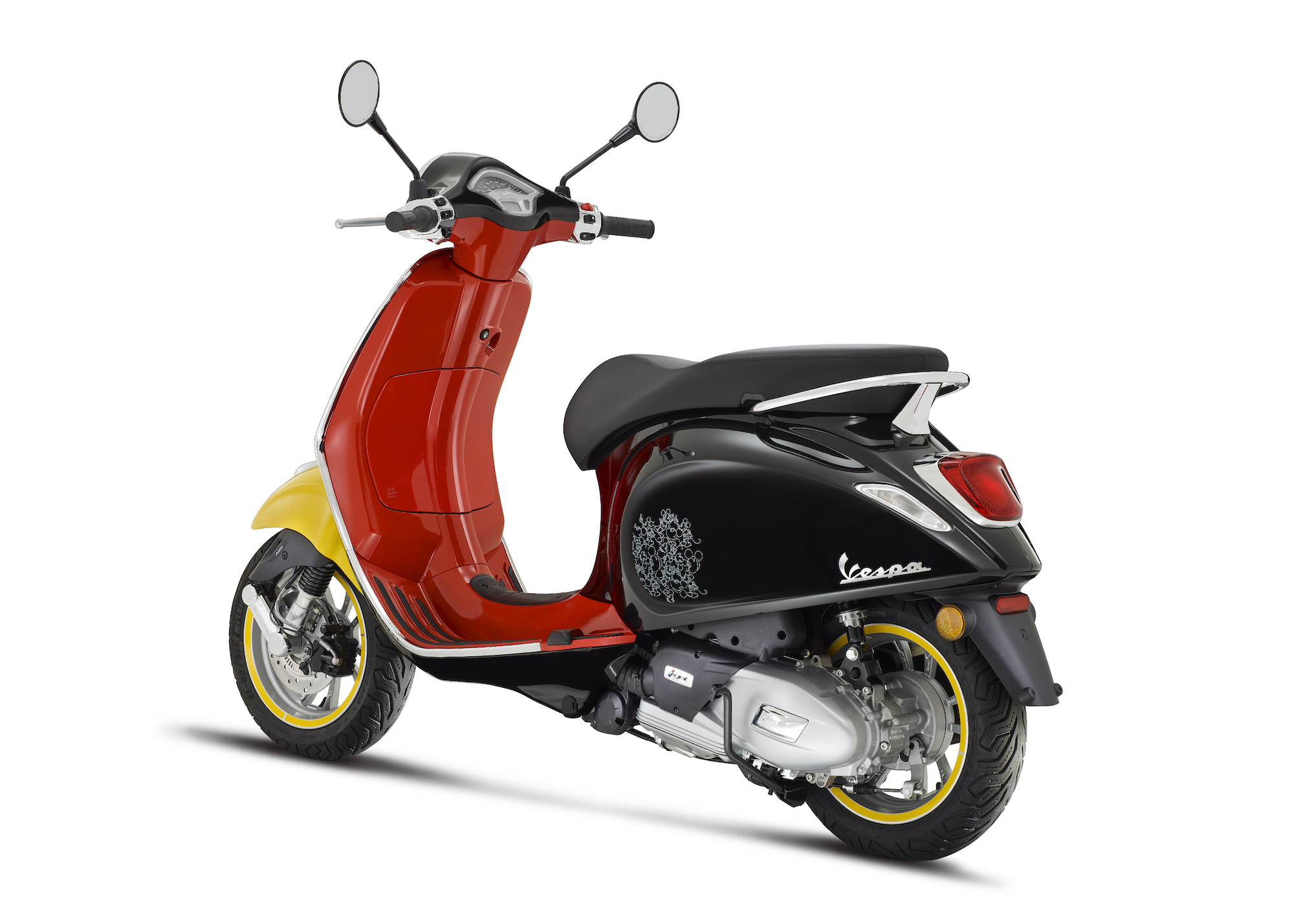 Vespa's 2023 Disney Mickey Mouse Edition scooter, built upon the brand's Primavera model. Media sourced from Piaggio's recent press release.