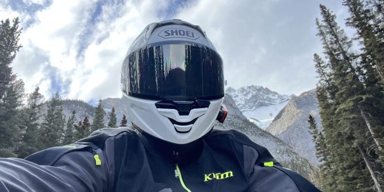 Front view of motorcycle rider wearing Shoei X-15 helmet