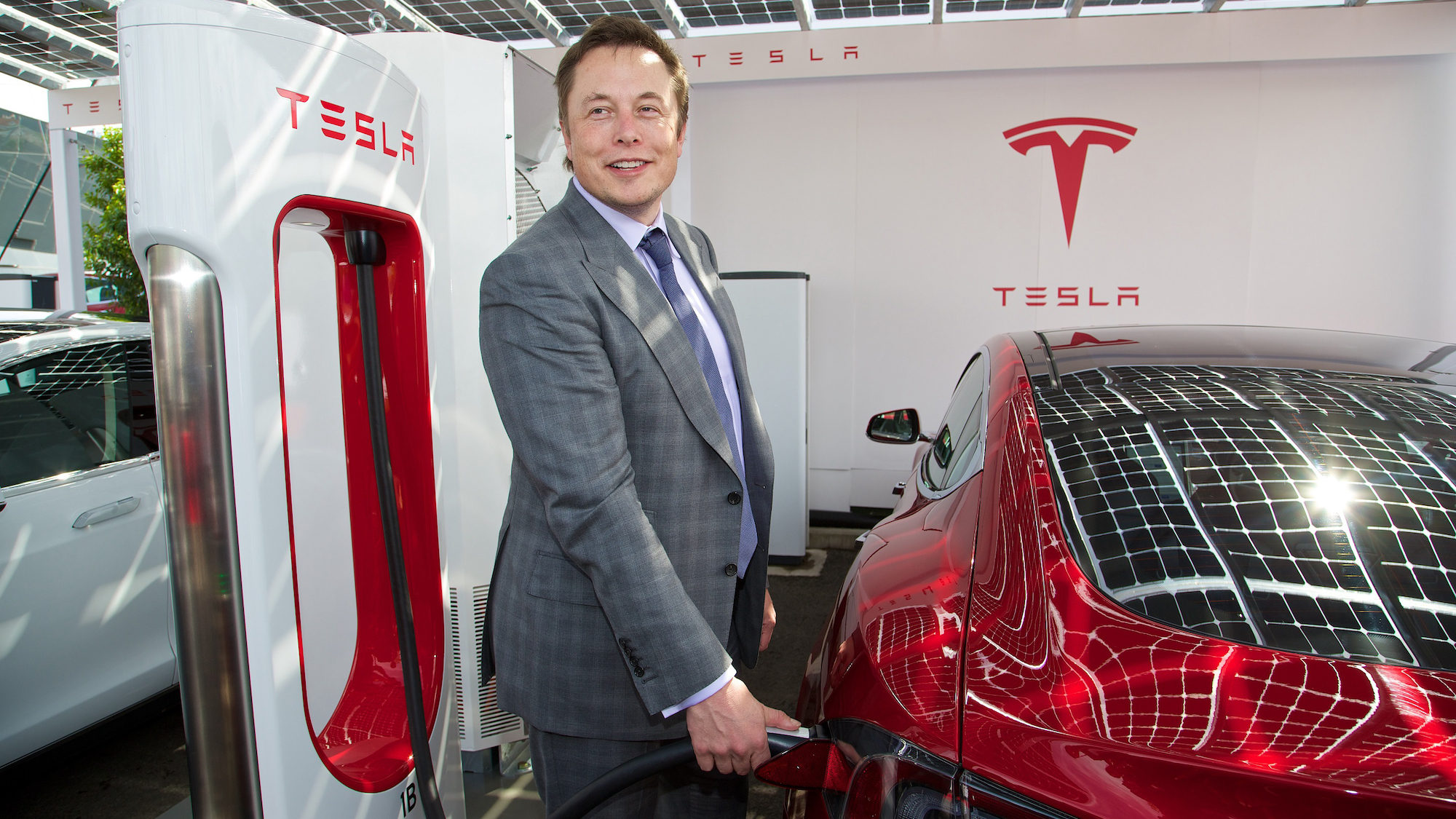 Elon Musk filling up at a Tesla Supercharger station. Media sourced from Top Gear.