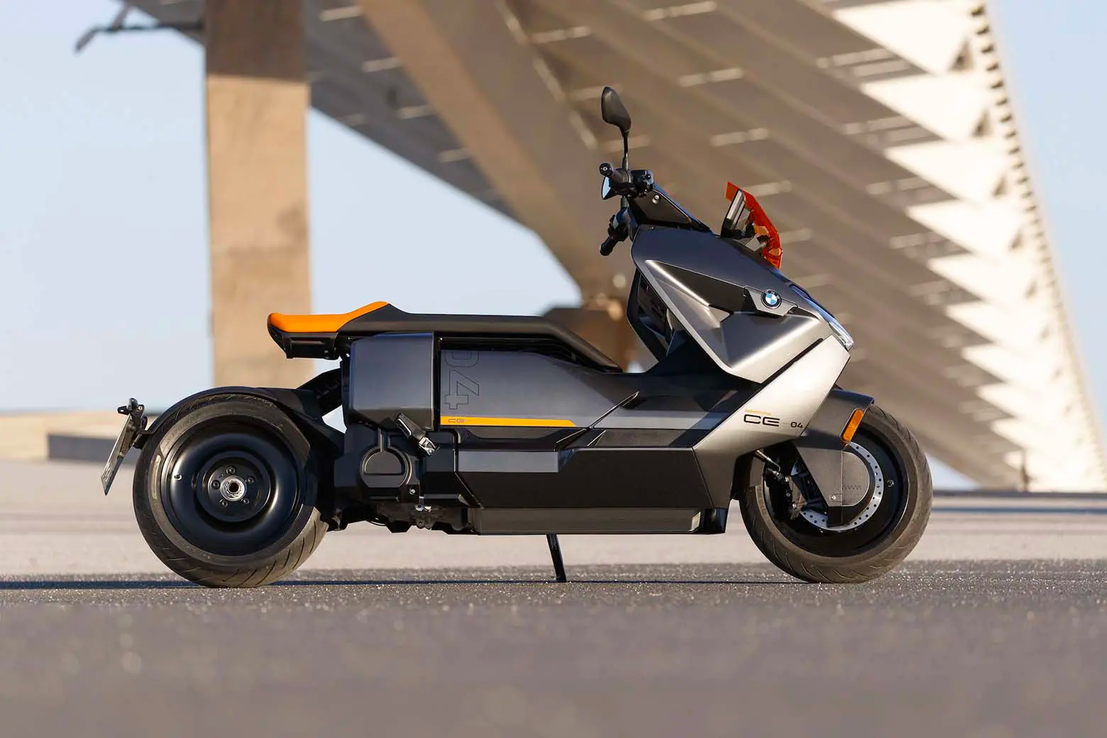BMW’s CE01 electric scooter parked under a bridge in Germany