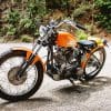 A classic Harley-Davidson Sportster motorcycle from the 1960s is park by the side of the road in Sydney, Australia