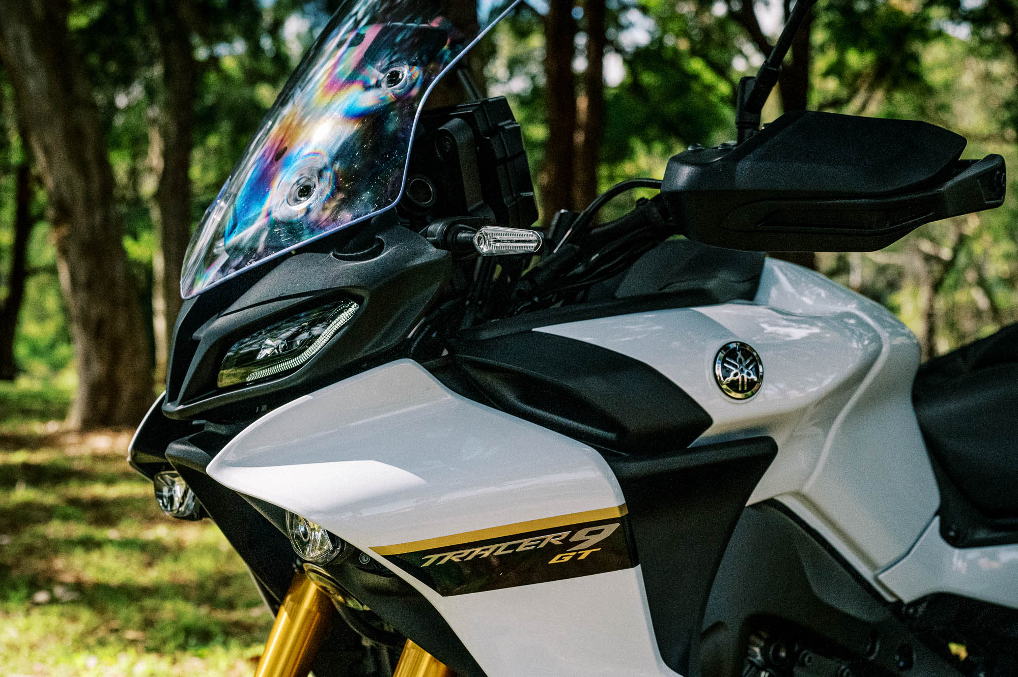 A detail shot of a 2023 Yamaha Tracer 9 GT Motorcycle in a Sydney Park