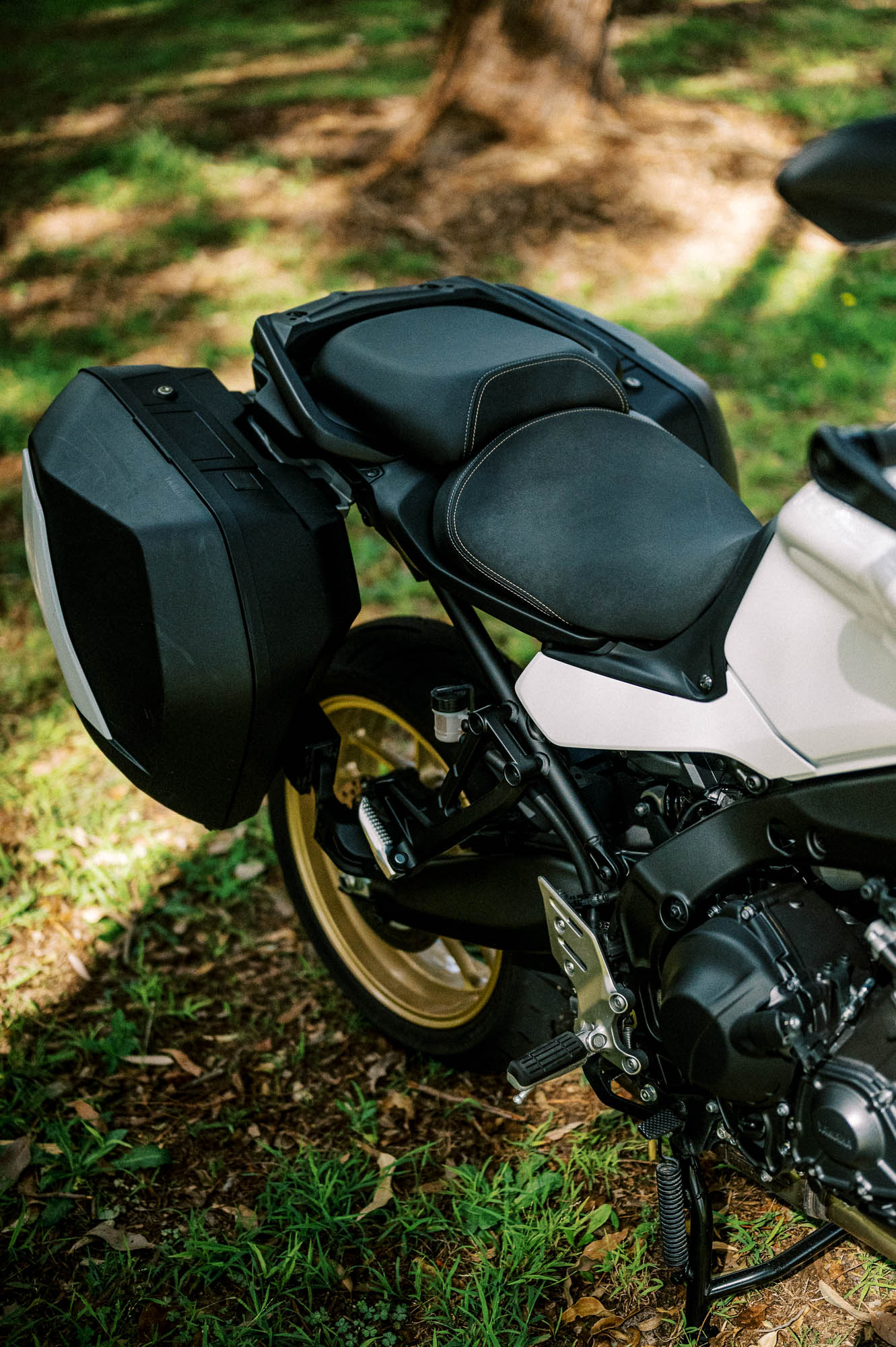 A detail shot of a 2023 Yamaha Tracer 9 GT Motorcycle in a Sydney Park