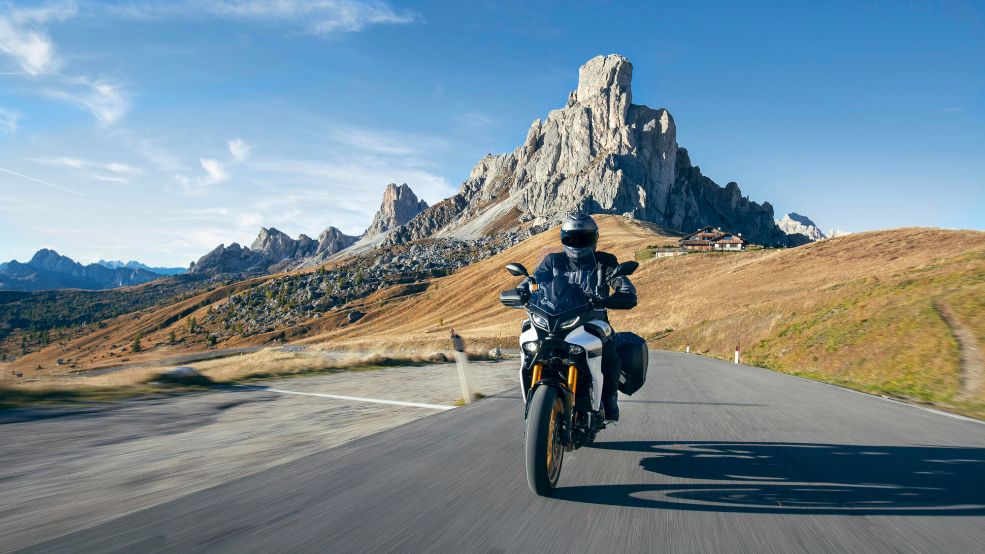 A 2023 Yamaha Tracer 9 GT Motorcycle on a European road