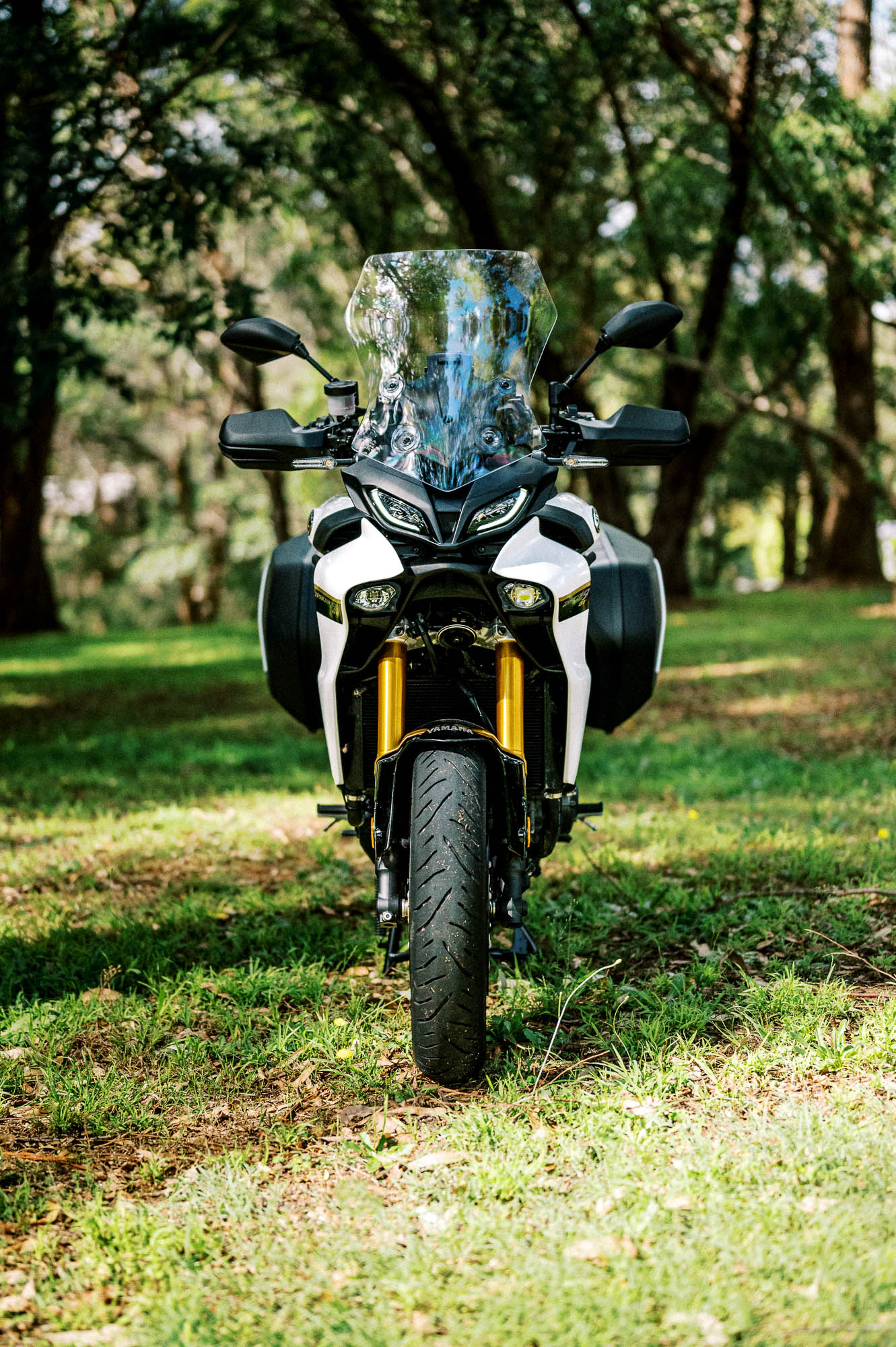 A detail shot of a 2023 Yamaha Tracer 9 GT Motorcycle in a Sydney Park