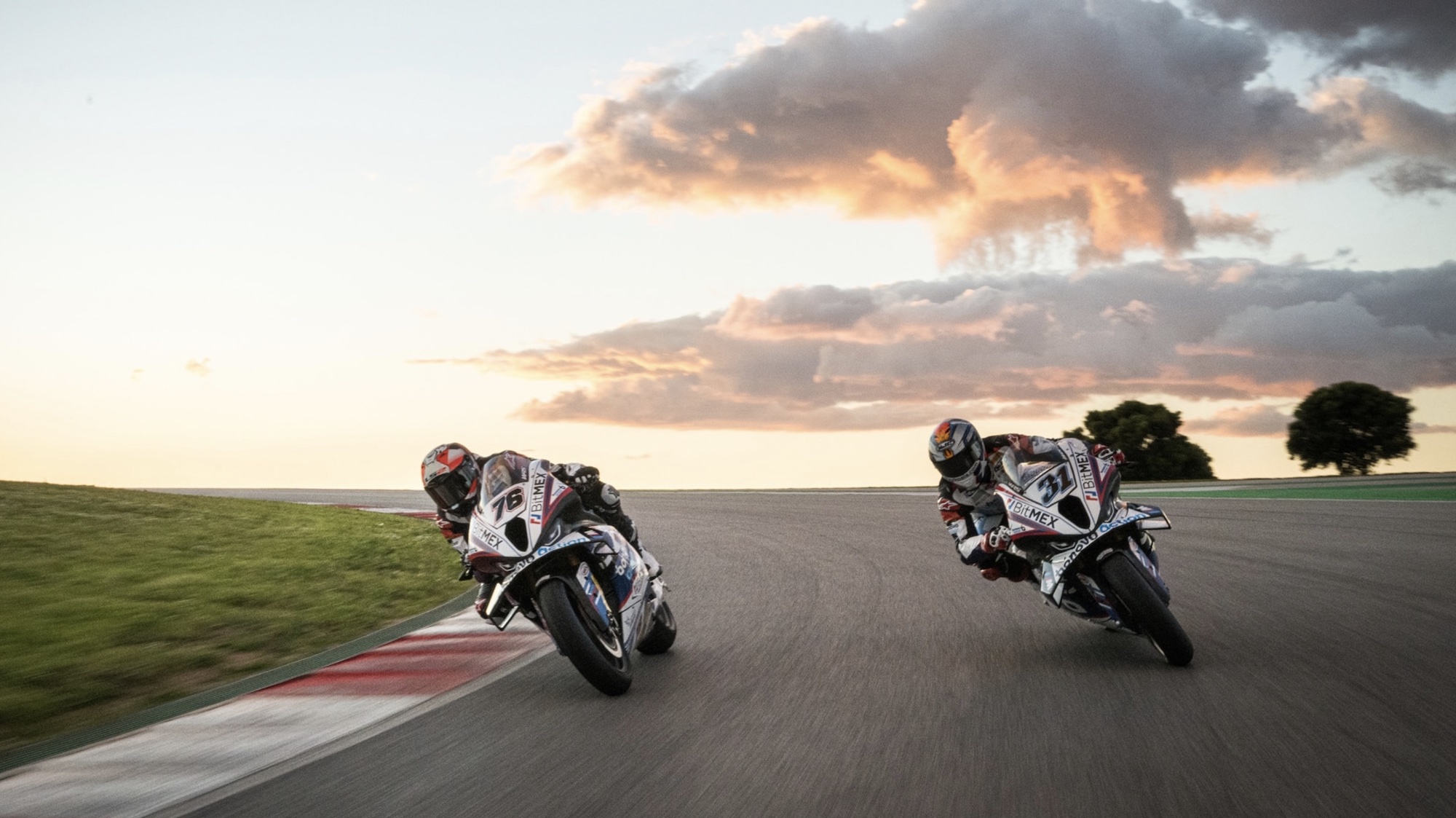 BMW motorcycles leaning into the twisties. Media sourced from BMW.